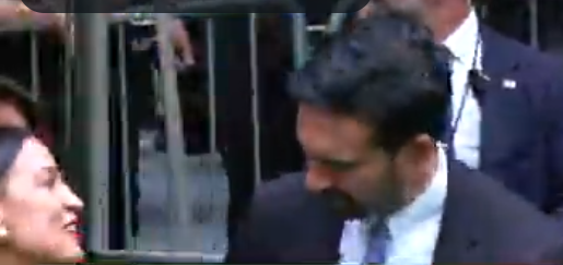 AOC and Mamdani Yukking It Up at Ground Zero While a Mourner Sobs Three Feet Away