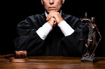 Biden Judge Rules It's Unconstitutional to Stop Non-Citizens From Voting — One Month Before the Election